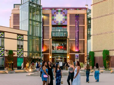 People standing outside of the Cerritos Center for the Performing Arts (CCPA)