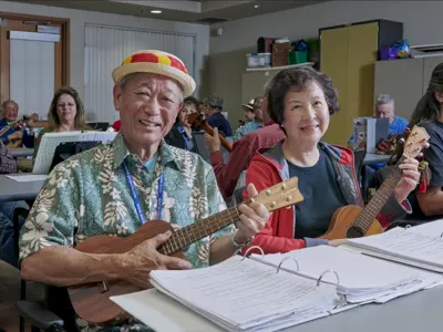 Residents enjoying a musical program at the Cerritos Senior Center